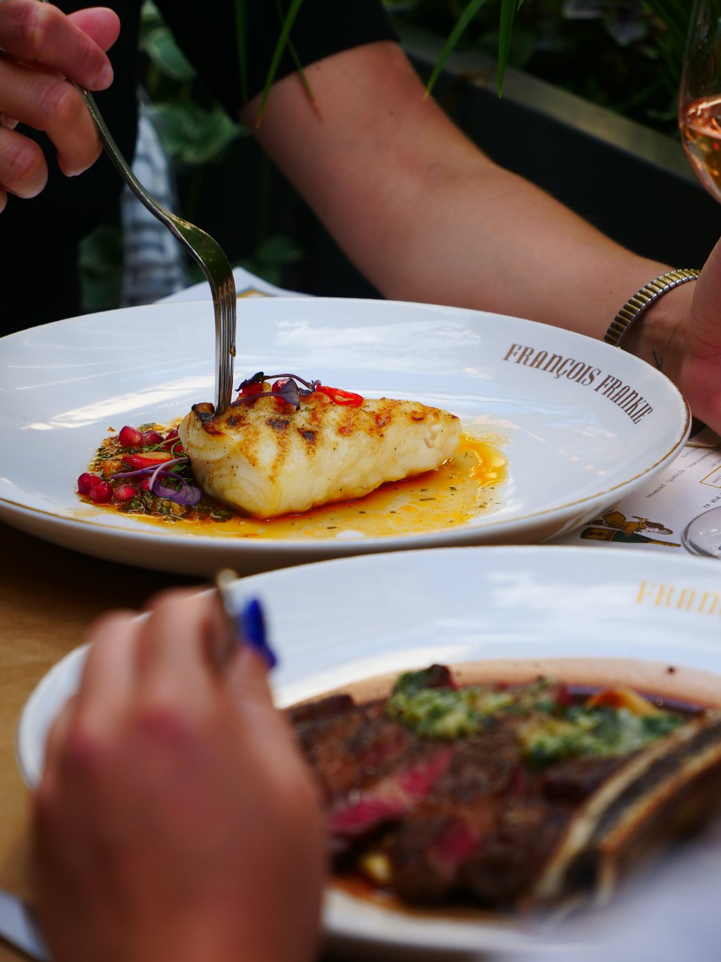 François Frankie — seared fish on branded plate