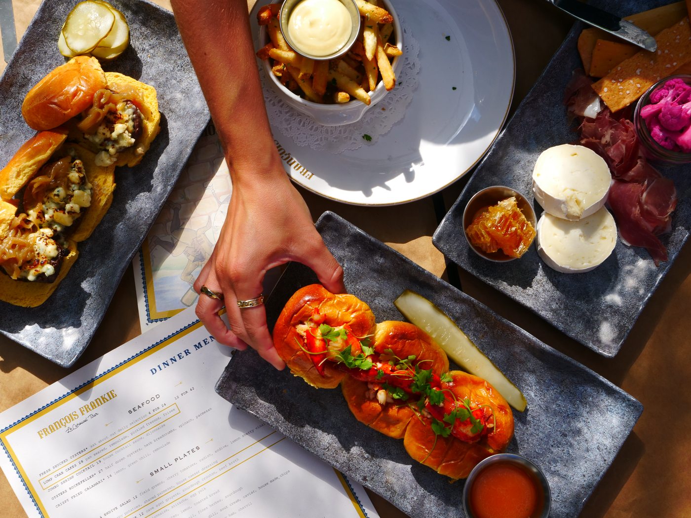 François Frankie — lobster roll table flatlay